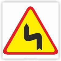 Znak drogowy Tablica informacyjna A-4 Niebezpieczne zakręty- pierwszy w lewo - znak ostrzegawczy 30x30 cm